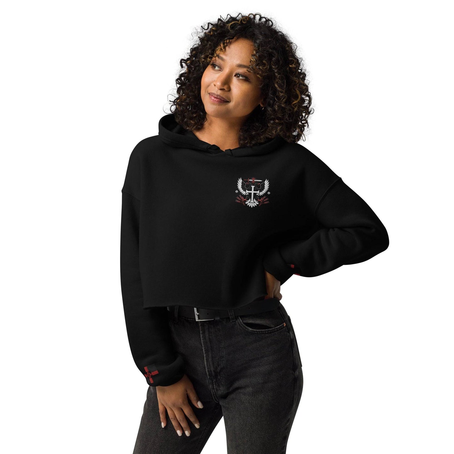 a woman with curly hair wearing a black hoodie