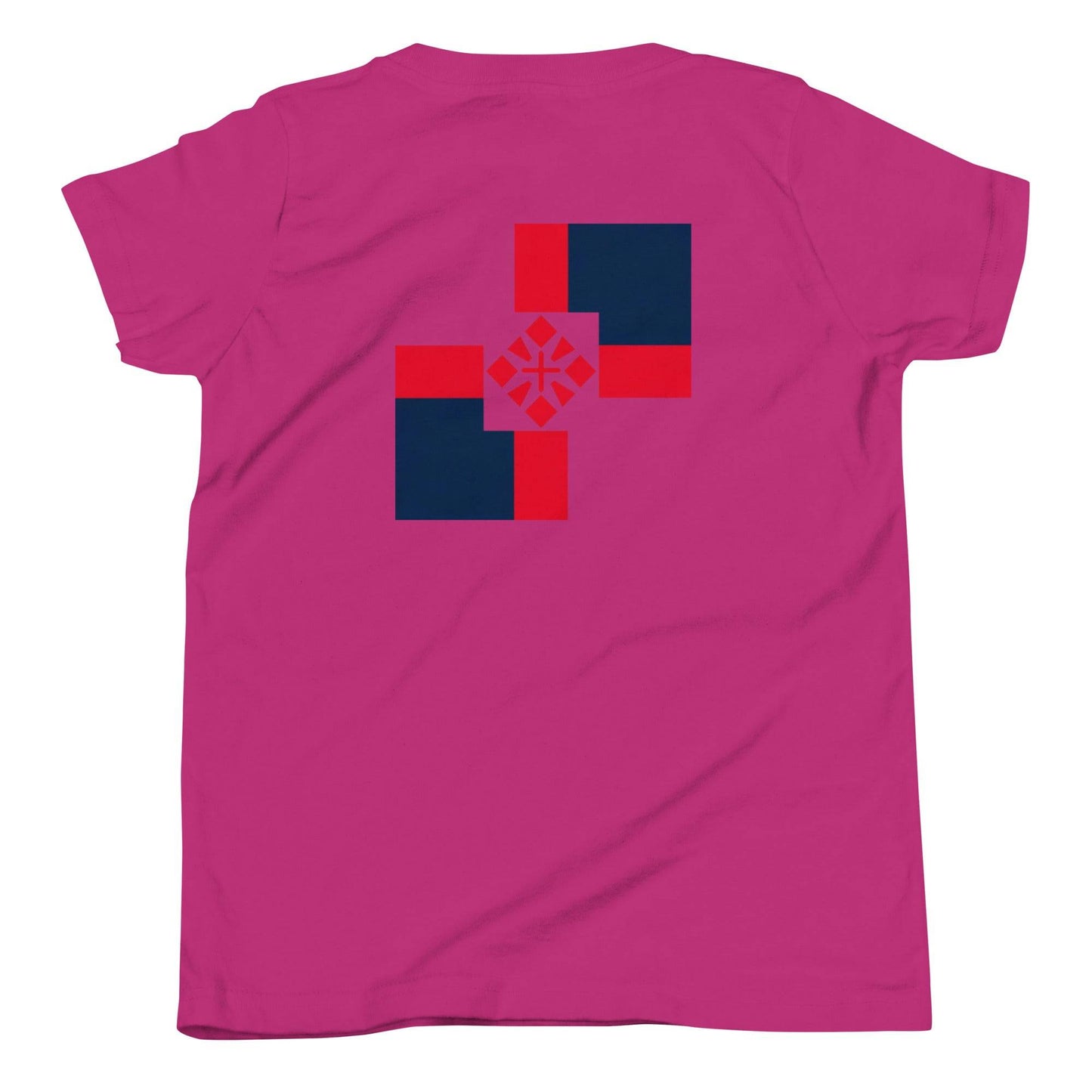 a pink t - shirt with a geometric design